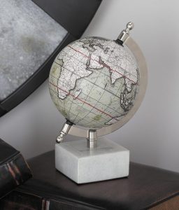 Discover the elegance of the Deco 79 marble globe with marble base. This diminutive white globe features an elegant design with a white marble base, silver iron frame and PVC globe. Perfect as an accent or centerpiece to your decor, this globe adds sophistication to any space. 