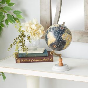 Enhance your decor with the Deco 79 Marble Globe. This charming decorative globe features a black-colored globe with multi-hued cartography, adding a classic appeal to any space. Made with premium quality marble, it is durable and lightweight. Perfect for study rooms, kids' rooms, or office desks, this globe is a versatile decor piece. It makes for a great gift option too.